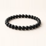 Karungali bracelet with smooth round matte-black ebony wood beads