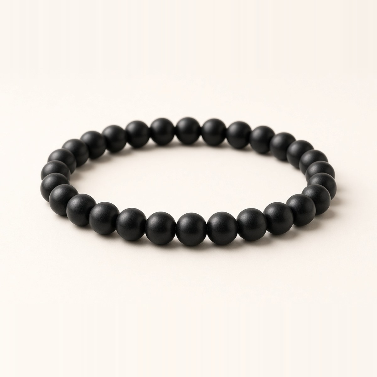 Karungali bracelet with smooth round matte-black ebony wood beads