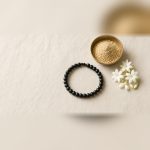 Karungali bracelet with sandalwood powder and jasmine flowers
