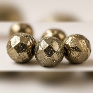 Close-up of natural golden pyrite beads on Manka Pyrite Bracelet