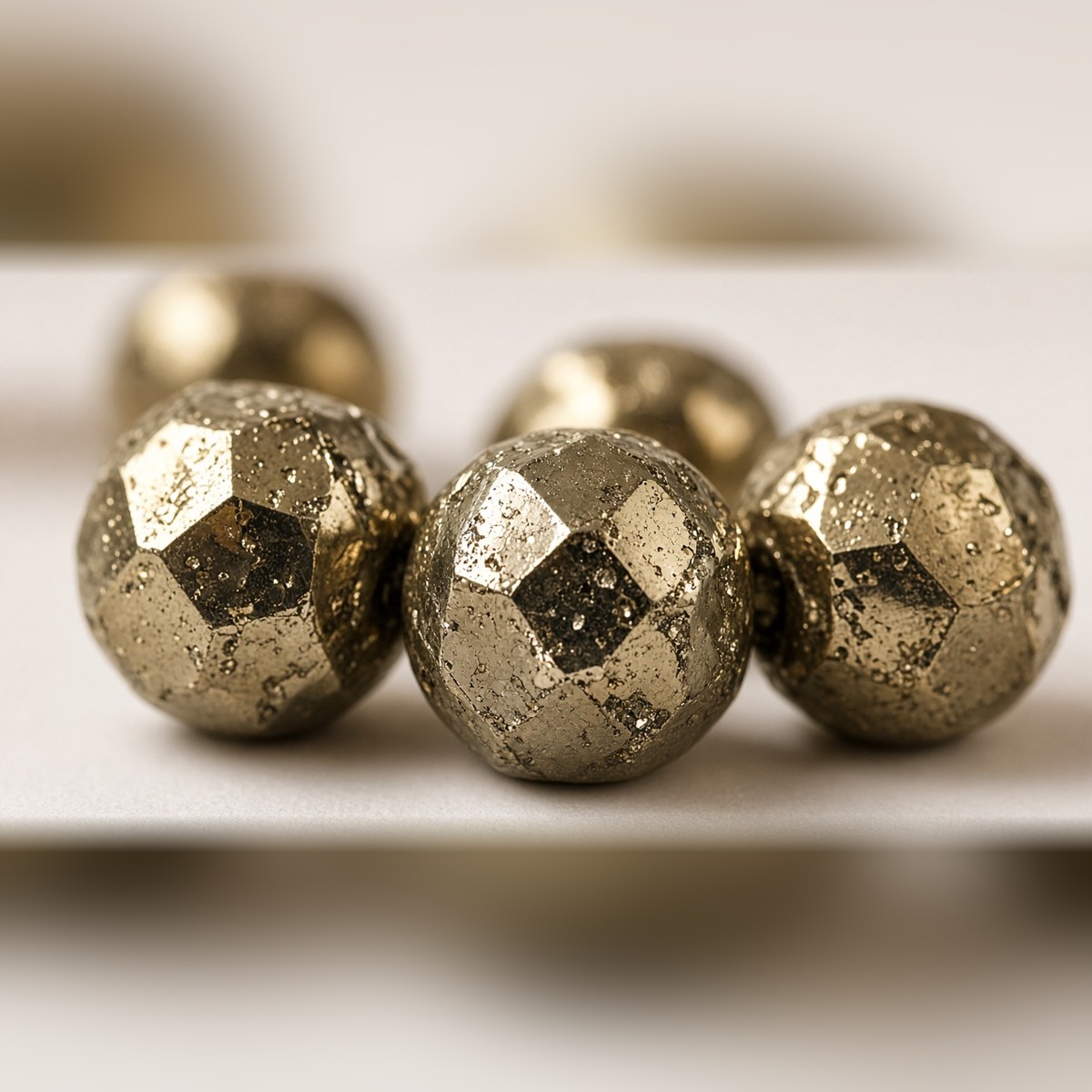 Close-up of natural golden pyrite beads on Manka Pyrite Bracelet