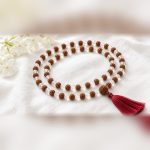 Rudraksha & Sphatik Mala with alternating rudraksha and clear quartz beads and red tassel – Manka